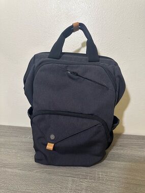 Black laptop. Backpack  with packets Minimal Urban Carry
